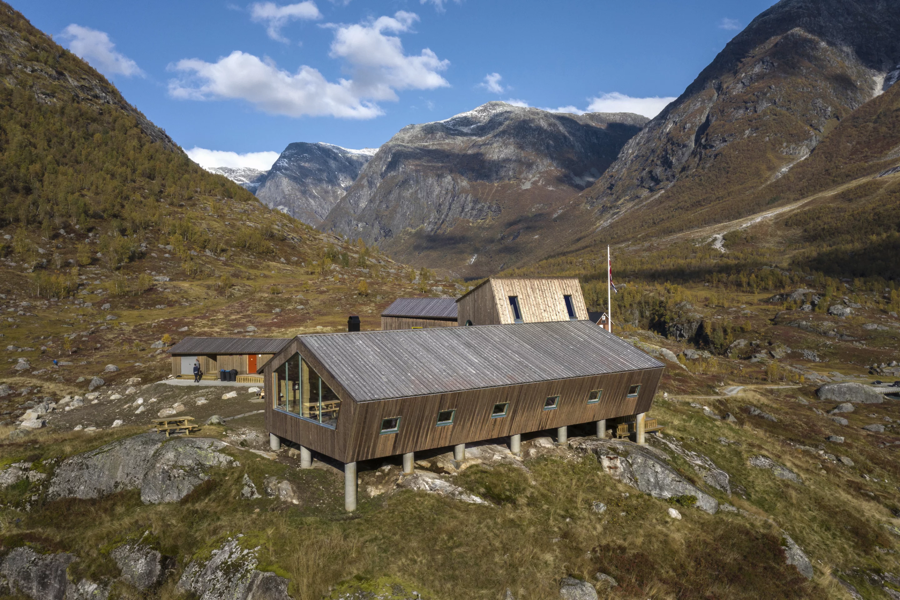 Tungestølen's cabins consist of glulam frames, covered by sheets of CLT, and are clad in pine