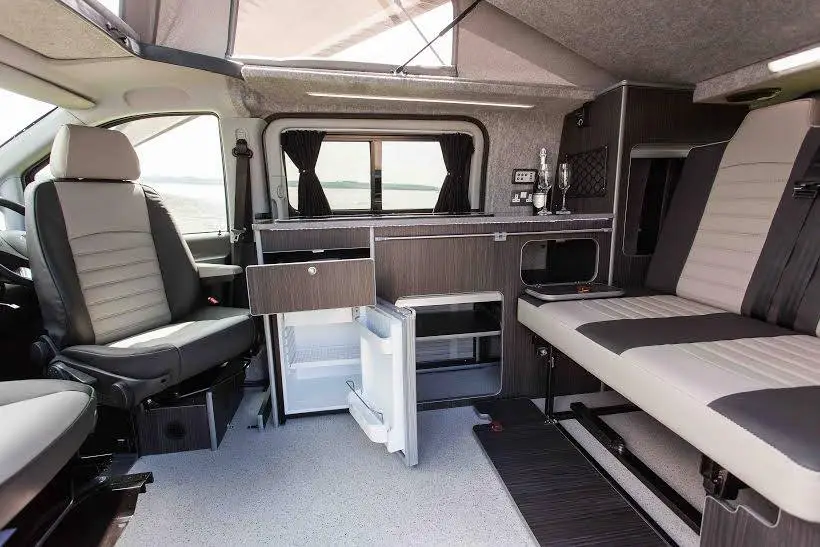 The Horizon includes a full kitchen area with stove, sink and refrigerator