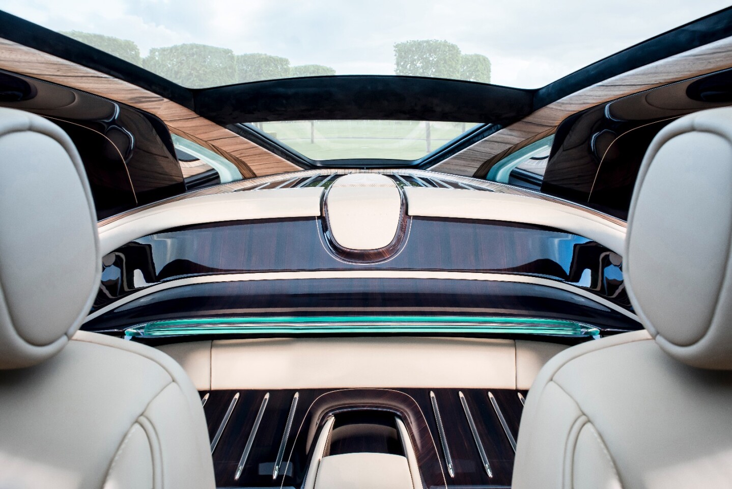 The rear seats have been ripped out of the Sweptail, and a wooden luggage area have been included in their place