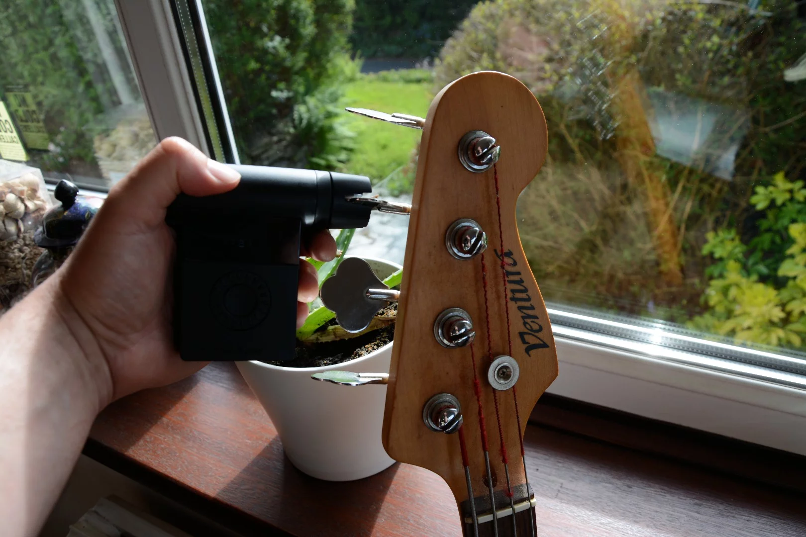 We had tuning trouble with one of the strings on producer and promoter Charilie Pritchard's bass guitar