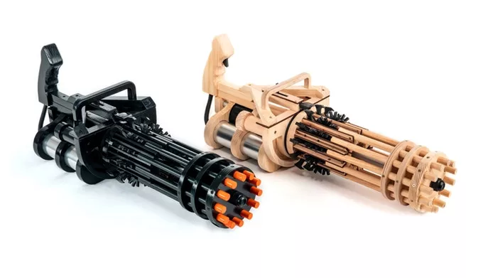 The Rubber Band Minigun is available in wood or a perhaps more intimidating black paint job
