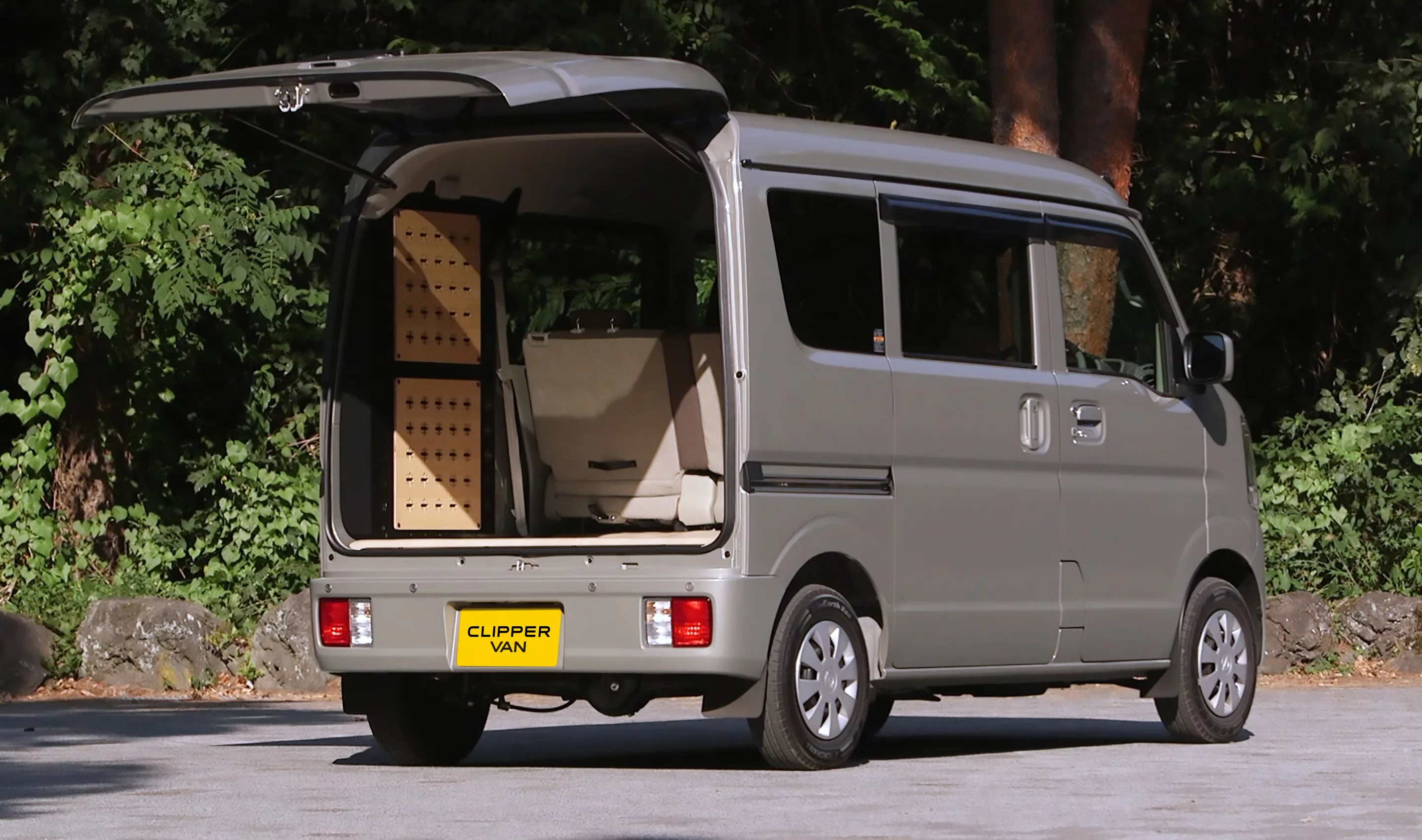 Nissan's unassuming little Clipper commercial van doubles as a tiny camper and micro-adventurer