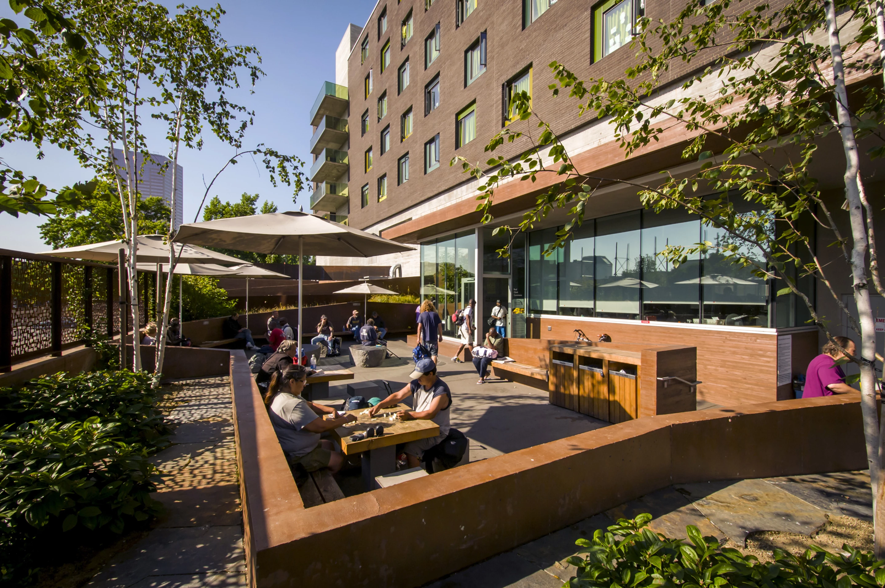 The Bud Clark Commons building contains a walk-in day center, support services, 90 temporary shelter beds, and 130 furnished studio apartments which serve as permanent housing (Photo: Bruce Forster)