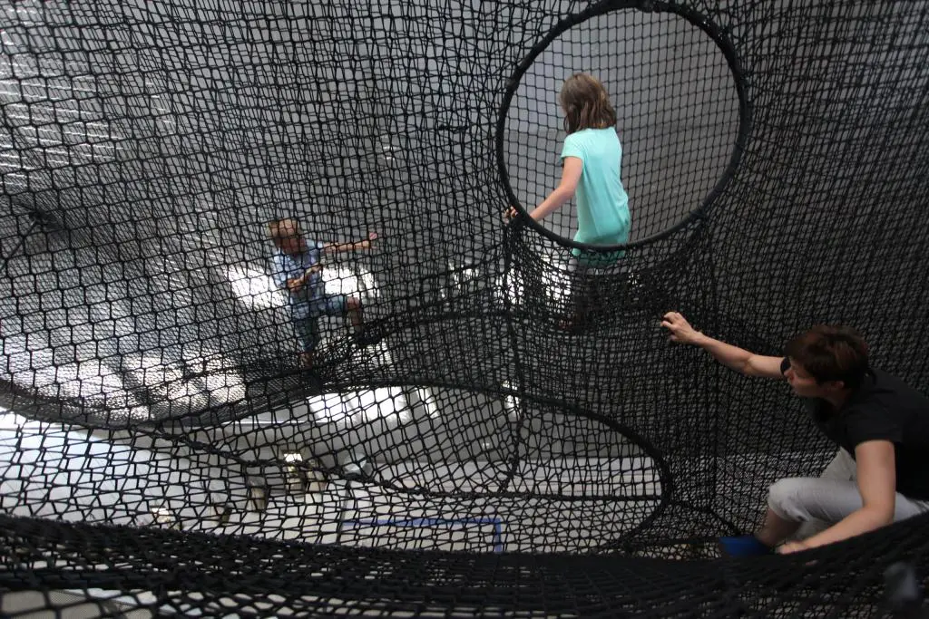 The circular openings are also used to provide access to different sections of the Net Linz installation