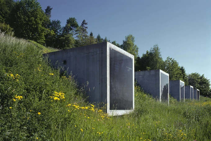 The private garage studio has been constructed into the hillside and features five giant concrete cubes
