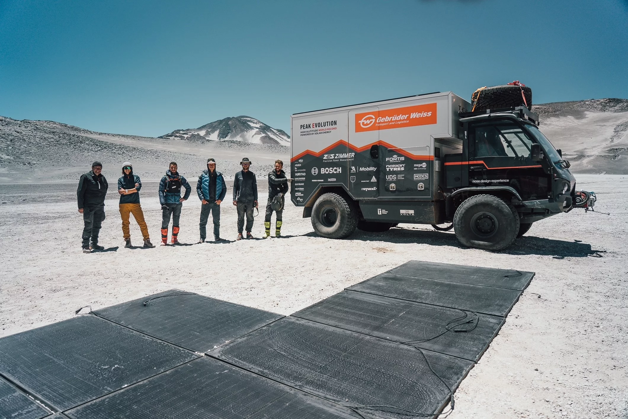 The team takes a charging and photo op break