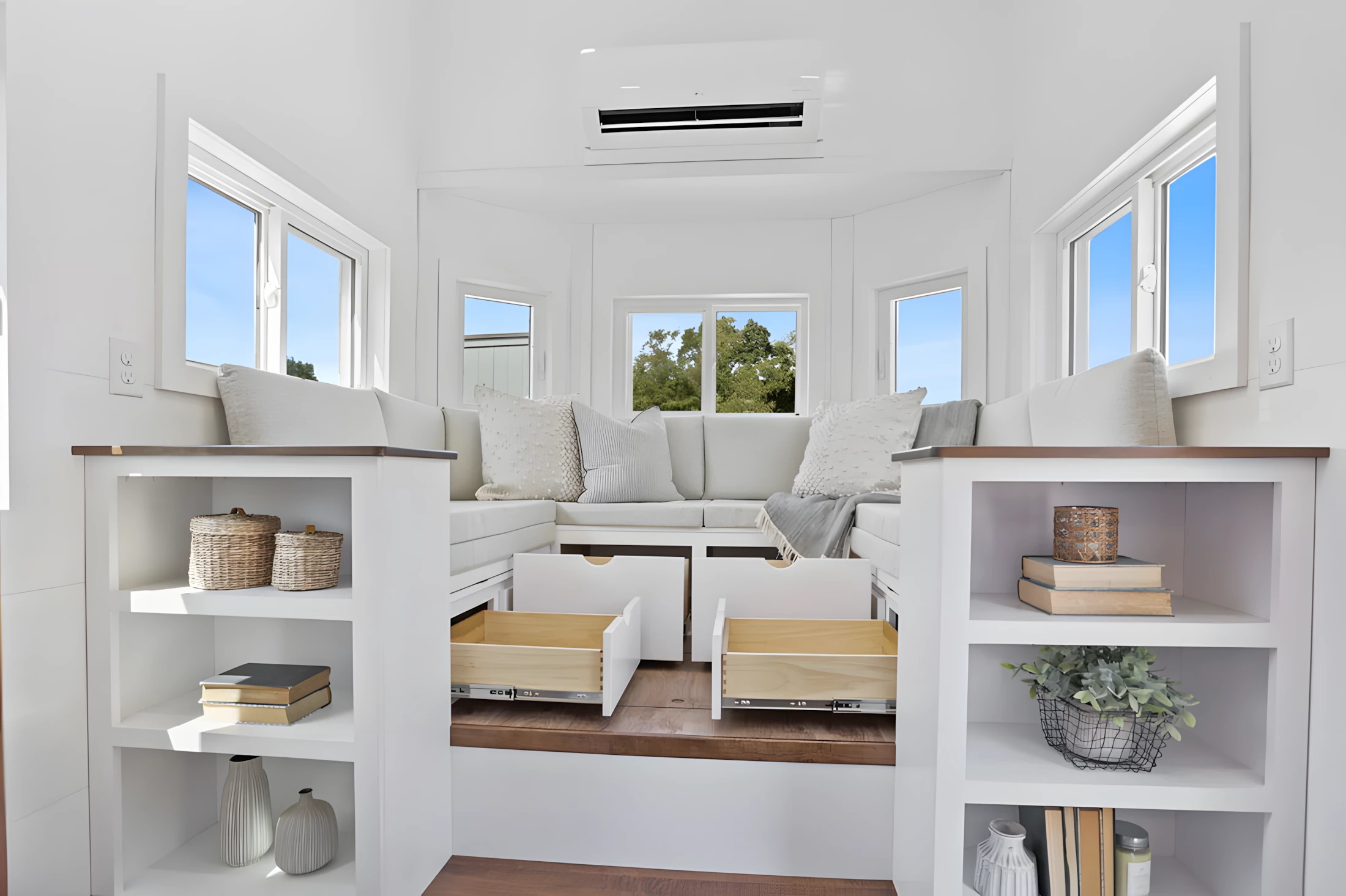 The Cerceaux's living room has lots of storage space built into its sofa