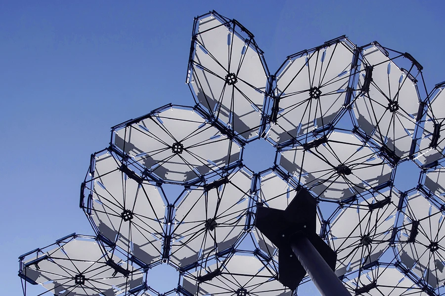 The Cyber Physical Macro Materials architectural system consists of a self-supporting roof structure with a canopy made up of tech-packed panels