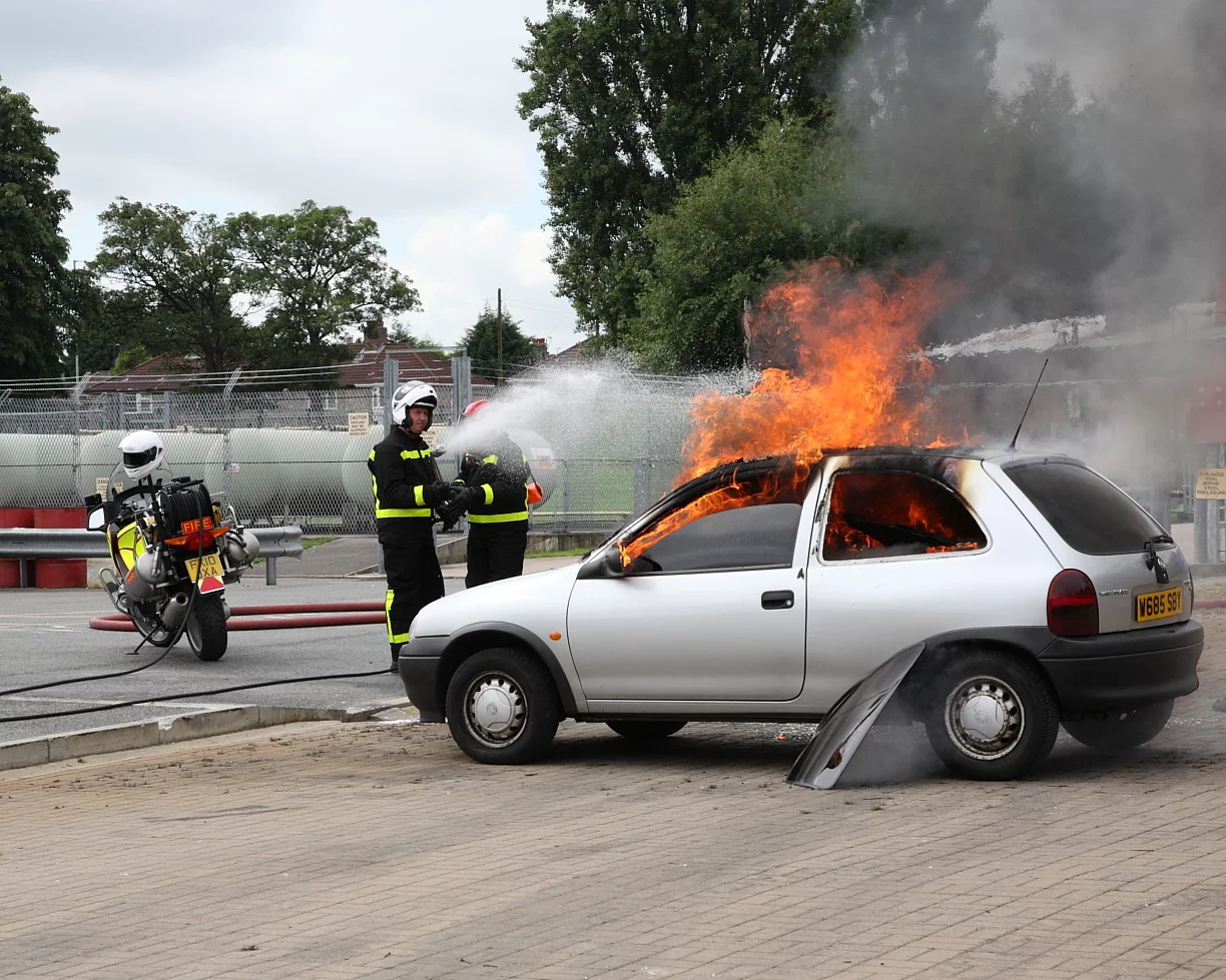 The 6-month trial will test two BMW RT1200 police-spec bikes that have been kitted out with two 25 liter water tanks and a 30 meter hose reel