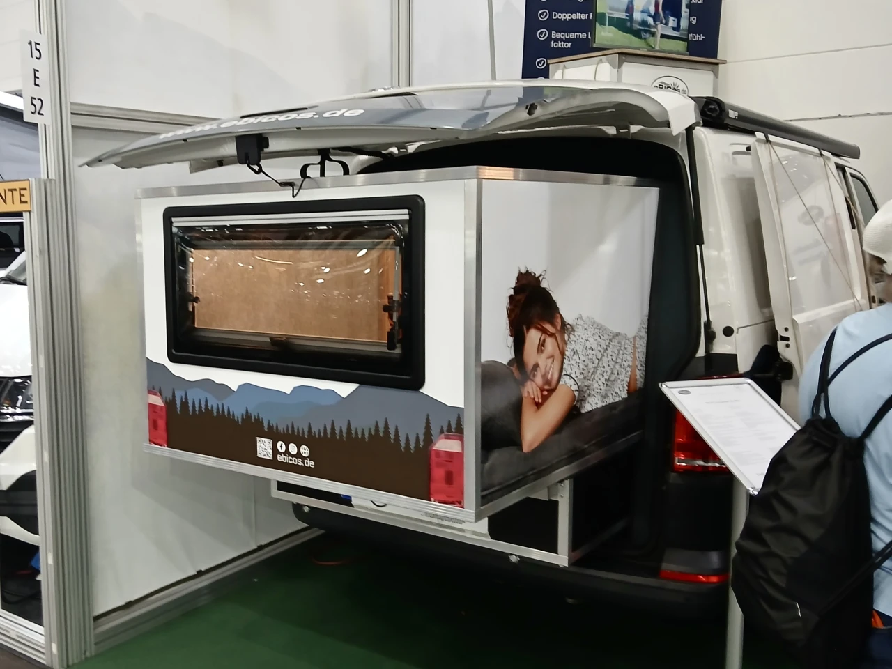 We might have missed a regular camper van in this cramped corner booth, but the power-slide Happy Dreamer Electric pod caught our eye as we wandered by
