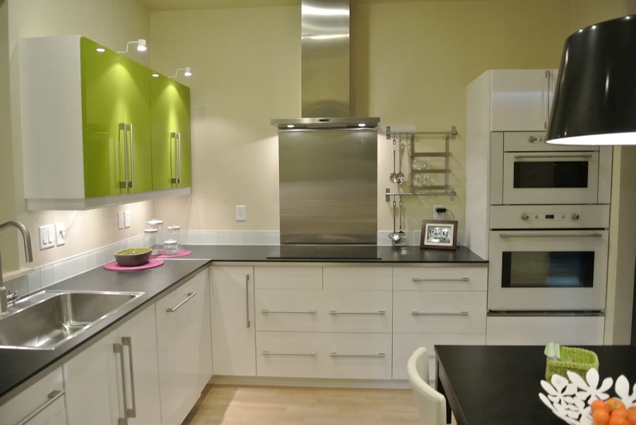 The kitchen features a functional working space with modern appliances