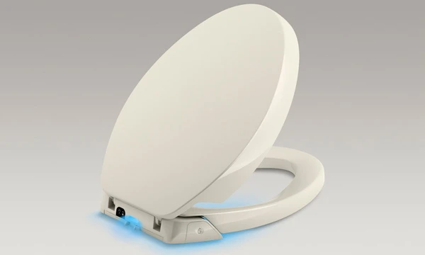 The seat incorporates a fan that's activated when the user sits down, which directs the toilet bowl air through a replaceable carbon filter and a scent pack