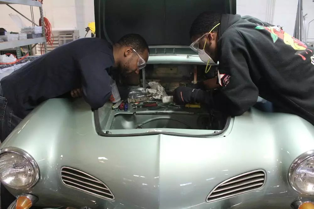 Team Ghia working on the car's electrics