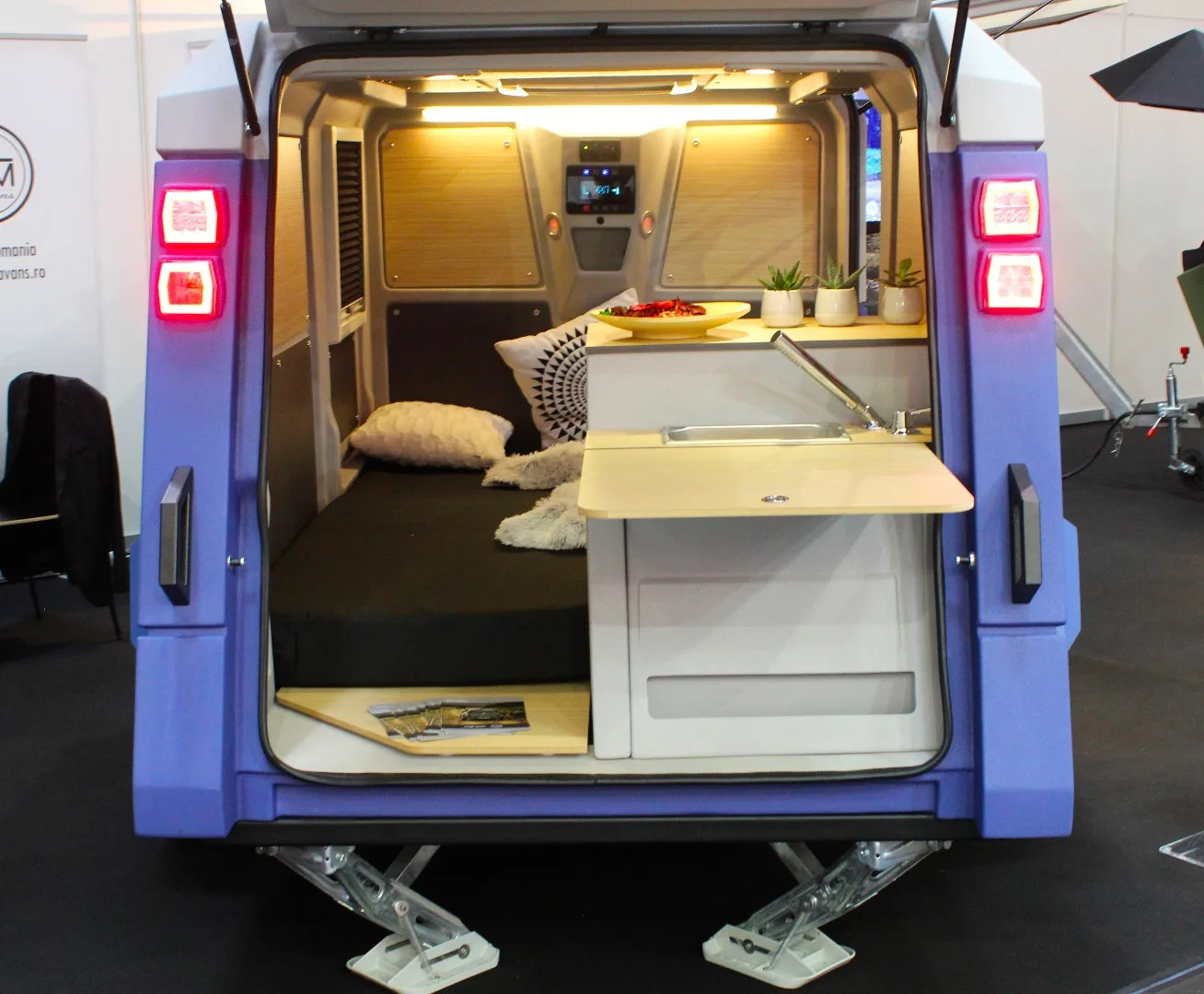 The Fim Migrator can be equipped with no tailgate galley, with the half-width galley shown here or with a full-width galley as on the green model above