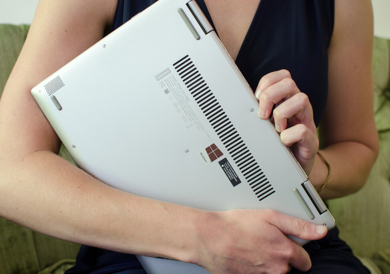 The underside of the Yoga 720 is dominated by fan vents