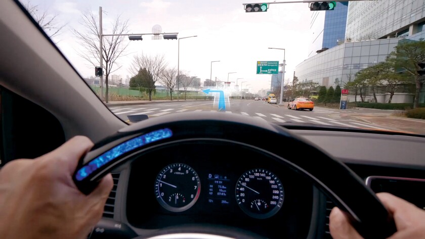Steering wheel indicators in LED and with tactile response can help with navigation aids, as shown here