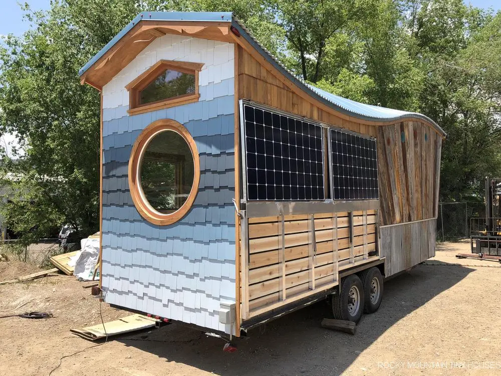 The San Juan Tiny House, shown with the folding porch and awning in place
