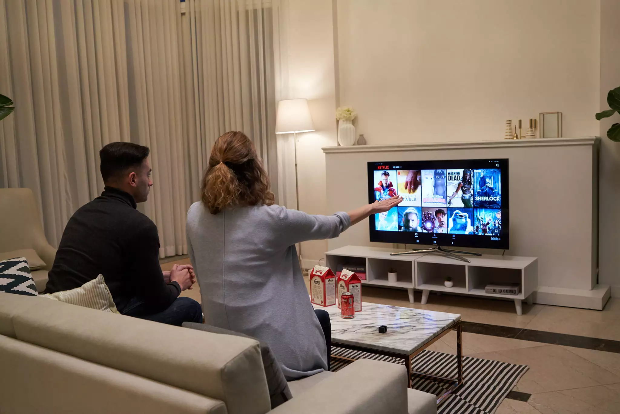 Glamos is a small device that projects a virtual touchscreen in the air, allowing regular TVs to become gesture-controlled