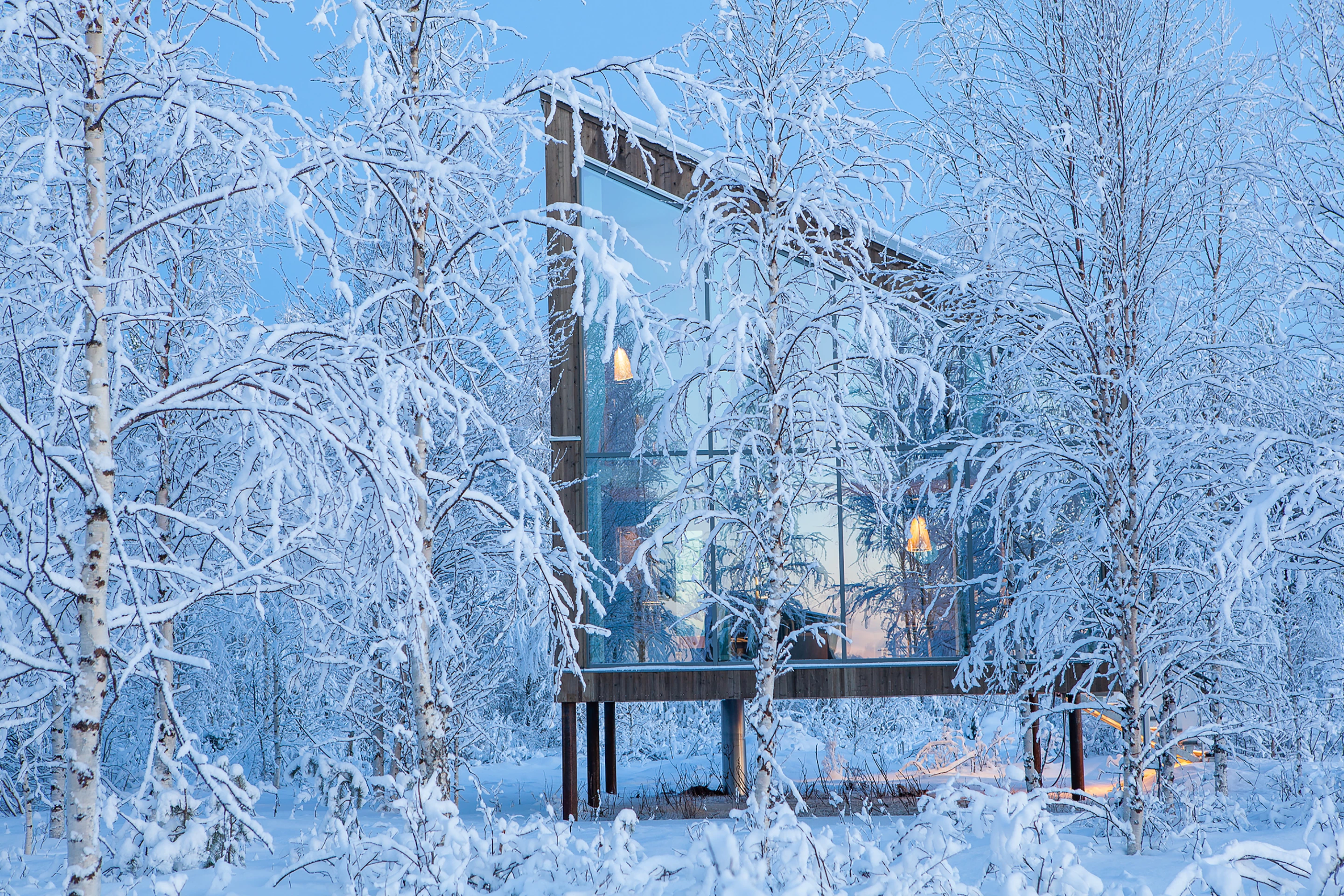 The Arctic Bath includes six elevated cabins on the shore designed by AnnKathrin Lundqvis
