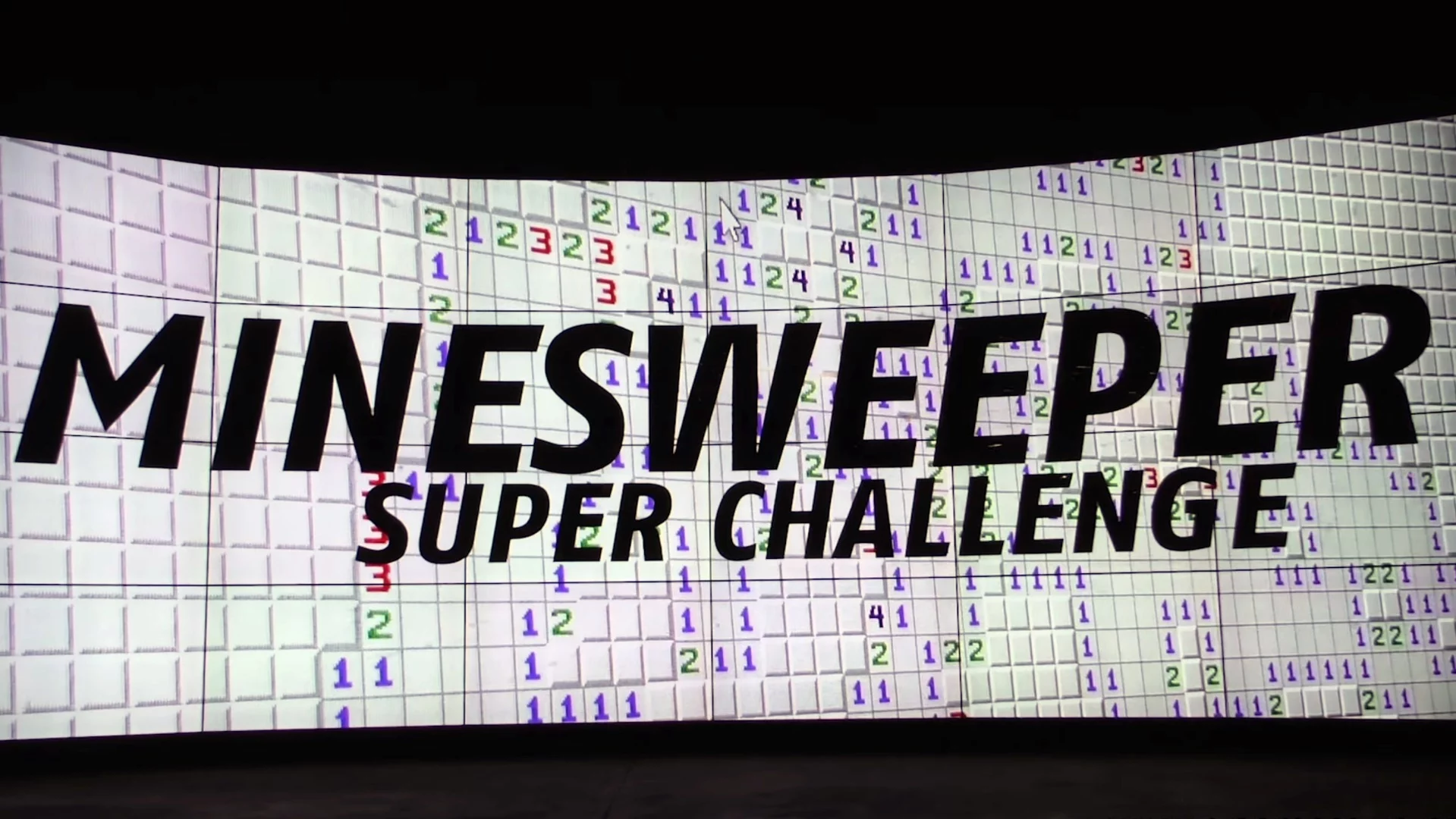The playing field is 24 linked HD TVs, forming a huge video wall, that when set to "Expert" level, contains 38,799 mines