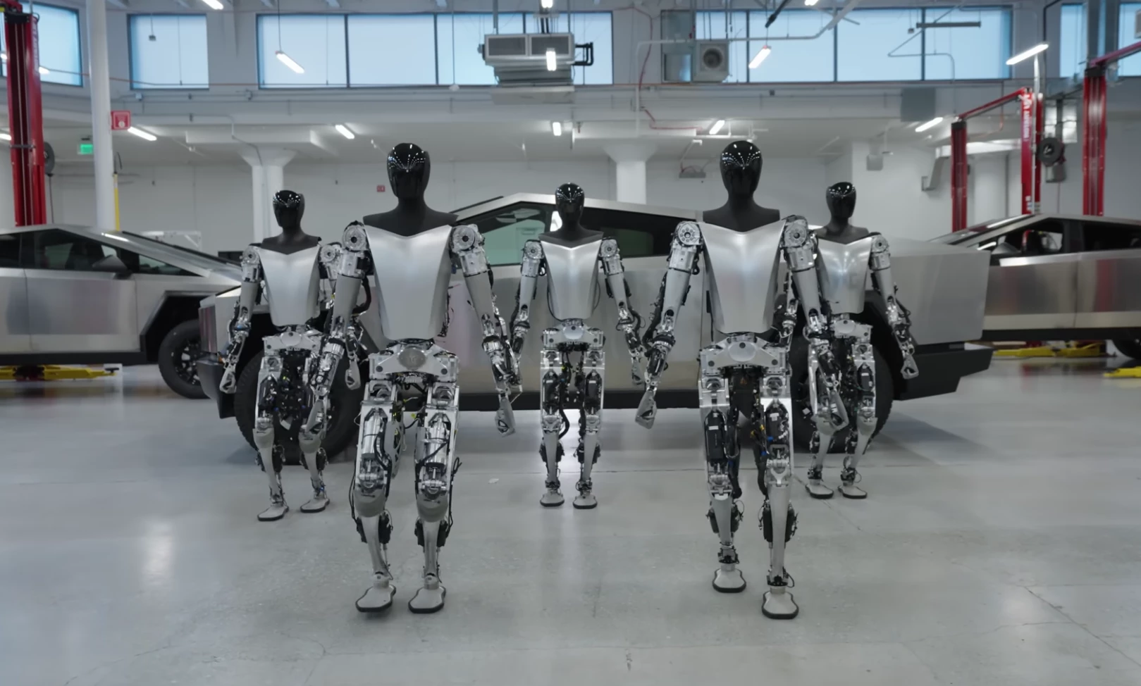 Tesla now has at least five Optimus prototypes capable of walking