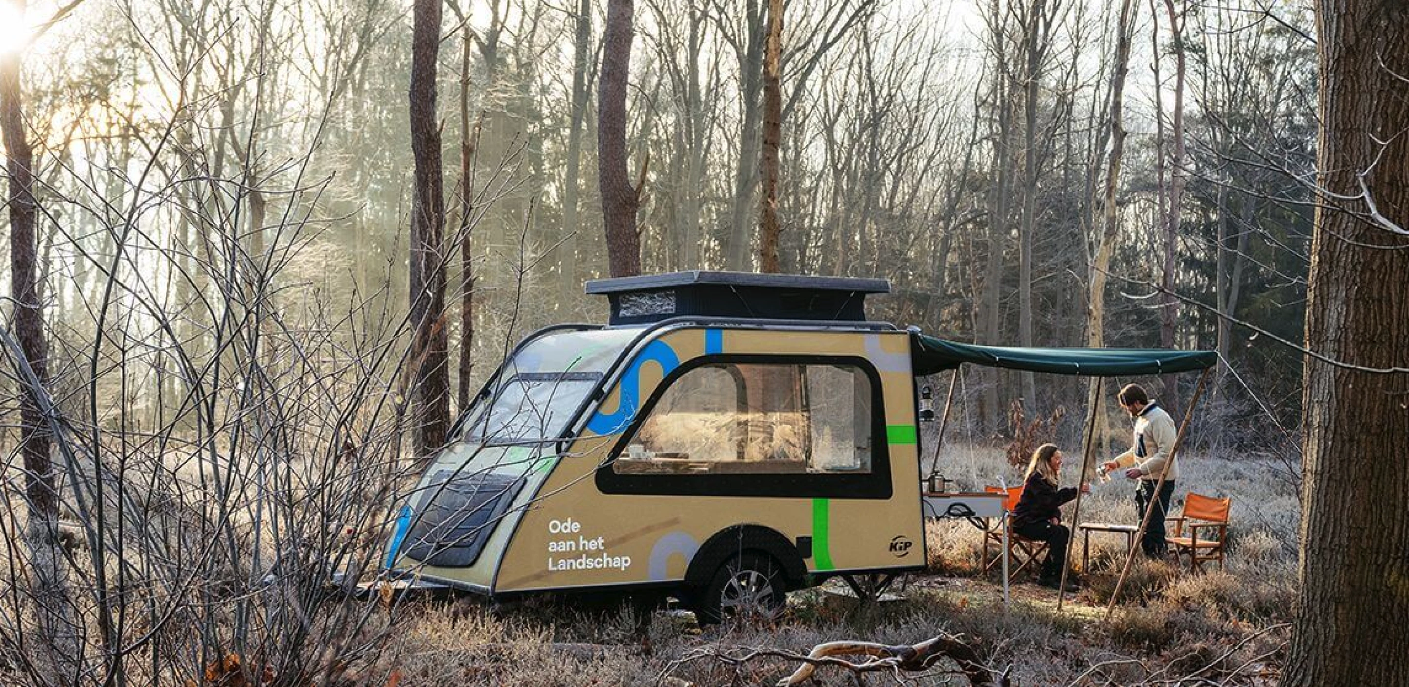 Window-loaded teardrop camper concept lets in big forest views