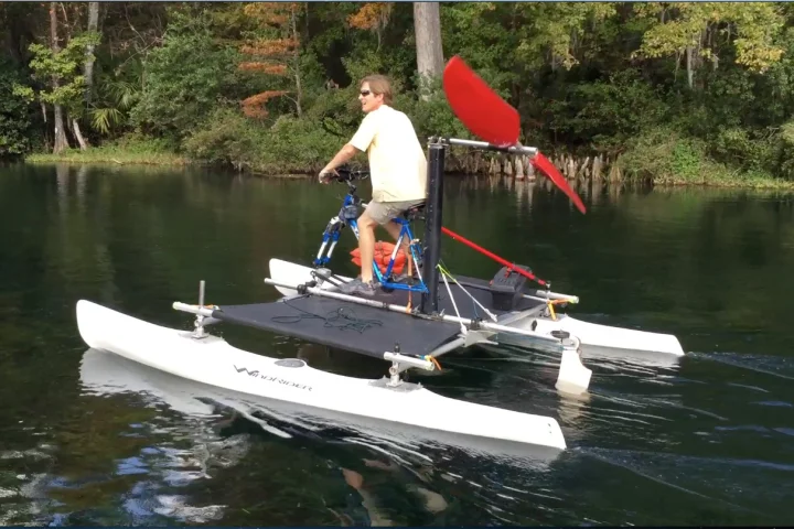 Russell Randall pedals a Seahorse on Florida's Rainbow River