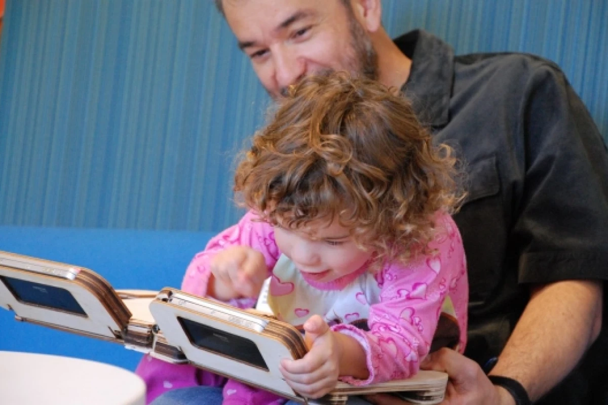 Parent and child enjoying the Storybook experience