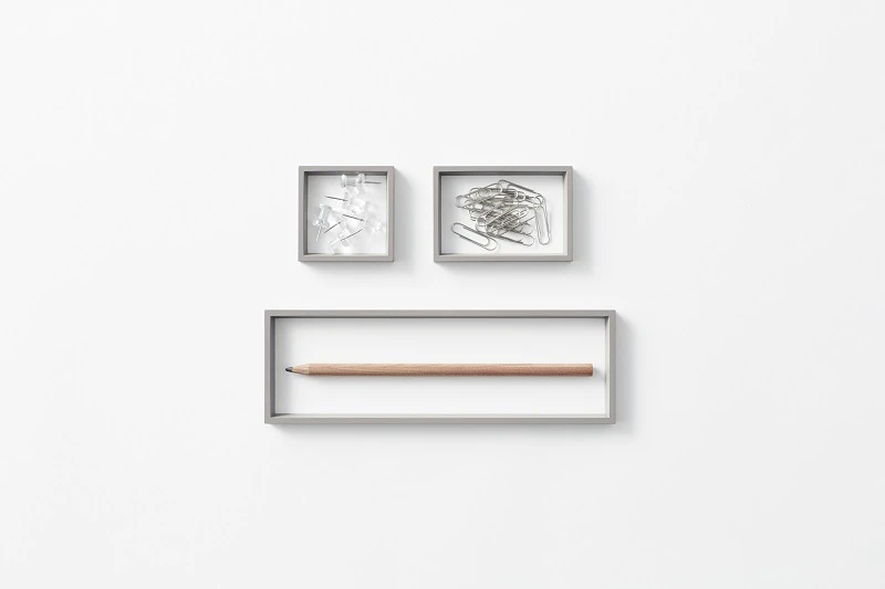 The desk-tidy can be easily placed over objects to group them