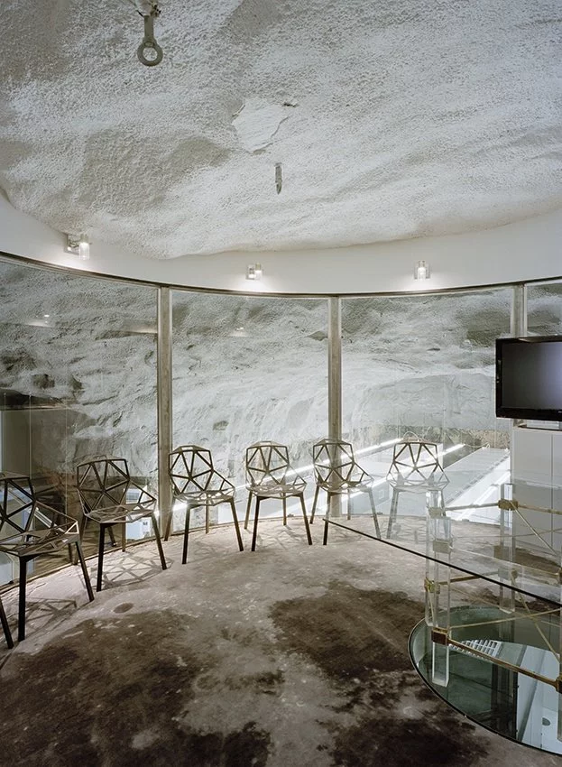 Set 30 meters underground, deep within the bedrock and in what was once used as a Swedish atomic bomb shelter, lies this high security internet center (image from AF-L)