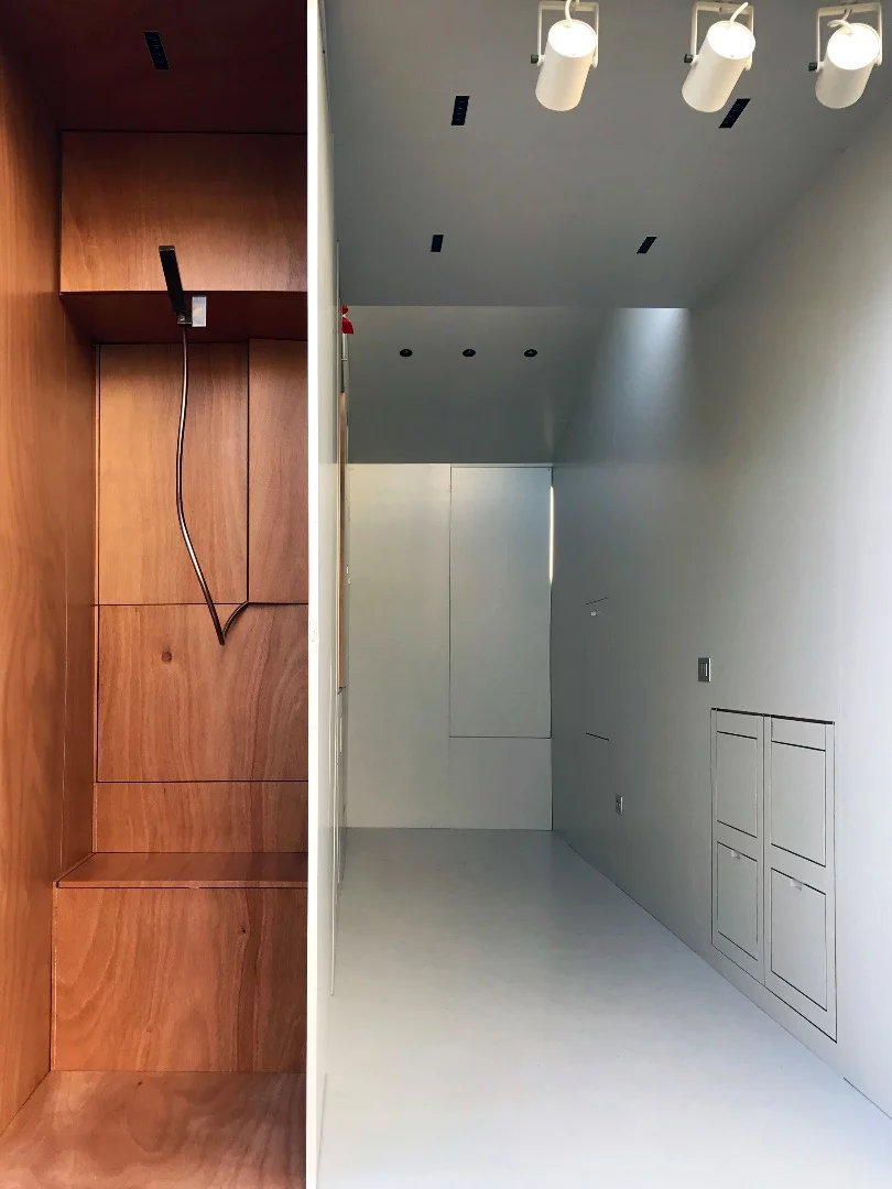 aVOID's bathroom looks like the kind you'd get in a small motorhome and includes storage space, mirror, shower, and a composting toilet