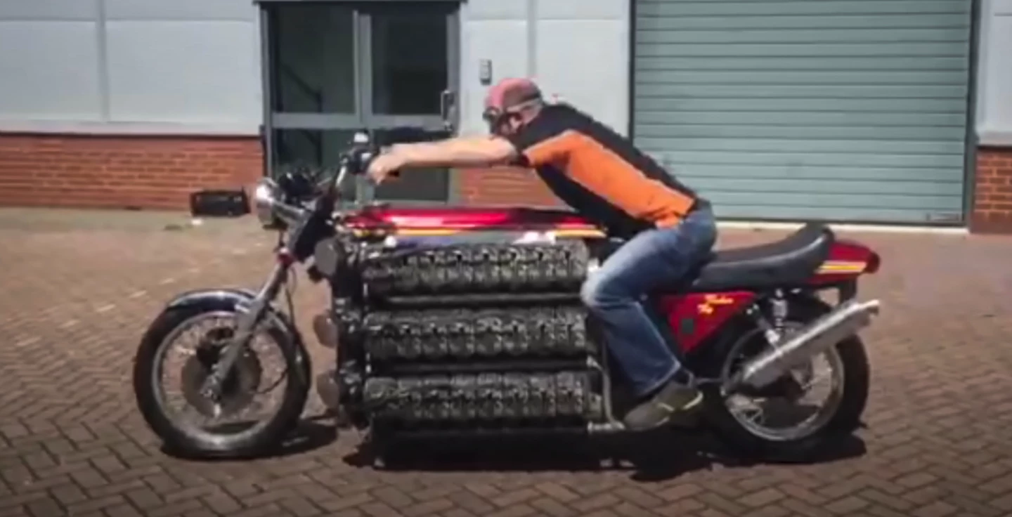 Simon Whitelock rides the 48-cylinder Tinker Toy... Very gingerly!