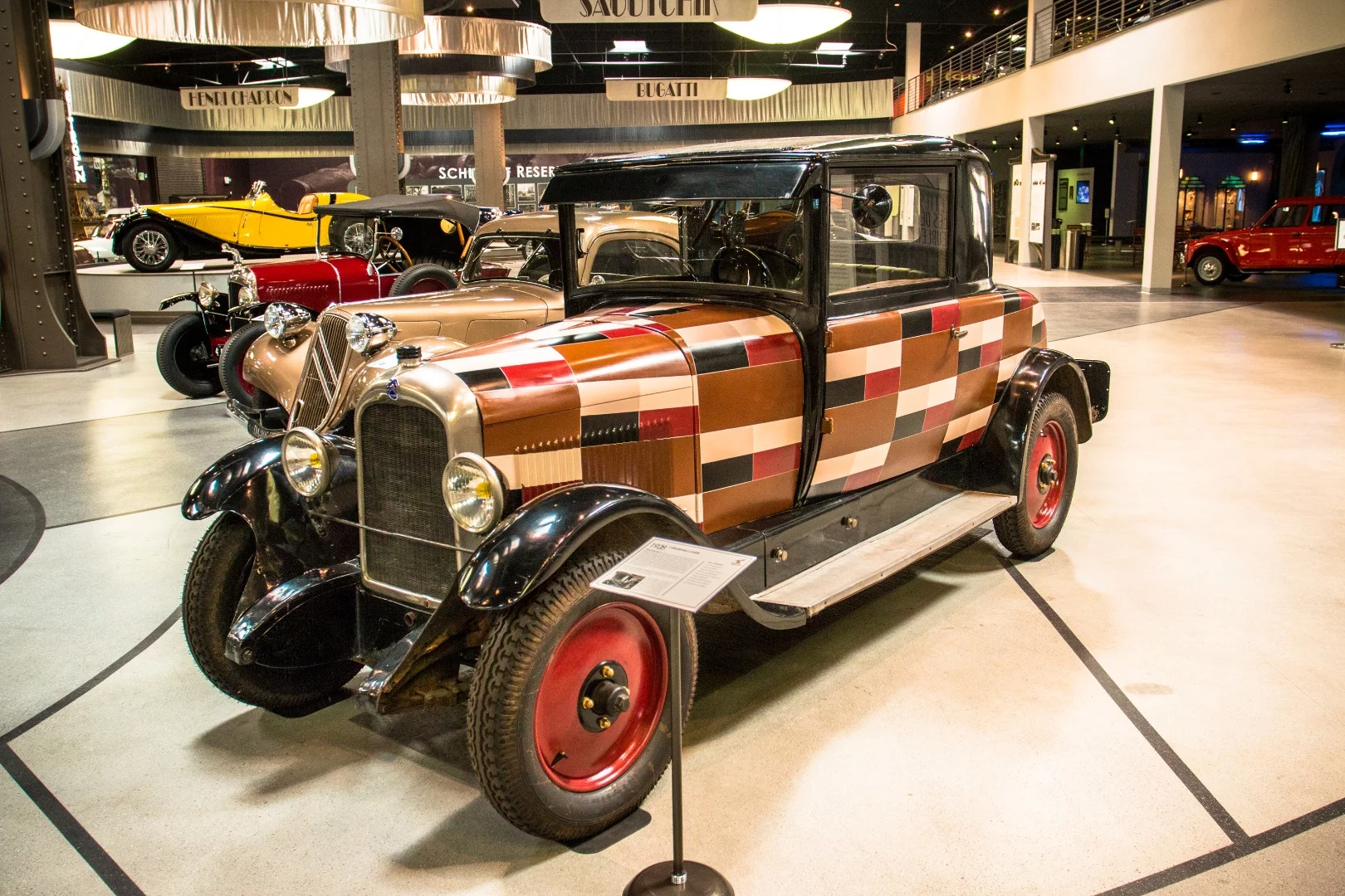 1928 Citroen B14 Coupe: the unique paint job here is the design of Ukrainian artist Sonia Delaunay, known with her husband Robert as the founders of the Simultanism and Orphism art movements. She "often created fashions to go with her painted cars."