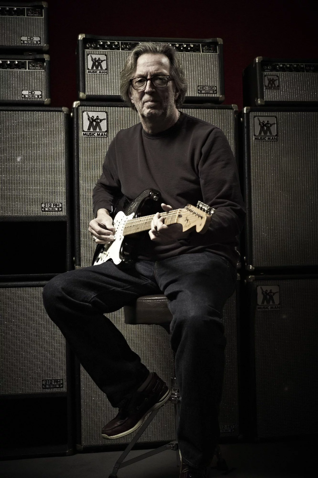 Eric Clapton with a signed 2006 'Blackie' recreation Stratocaster, estimated at between US$20,000 and US$30,000 (Credit: Original photo by Jack English, Marshbrook Limited 2010)