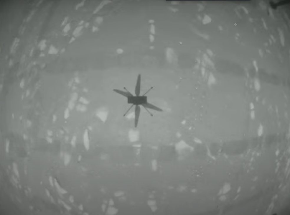 Photo taken by Ingenuity of its first flight on Mars