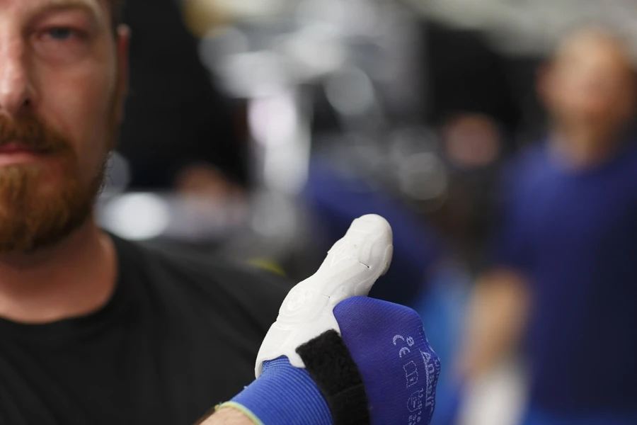 The supports are designed to slot onto a worker's thumb