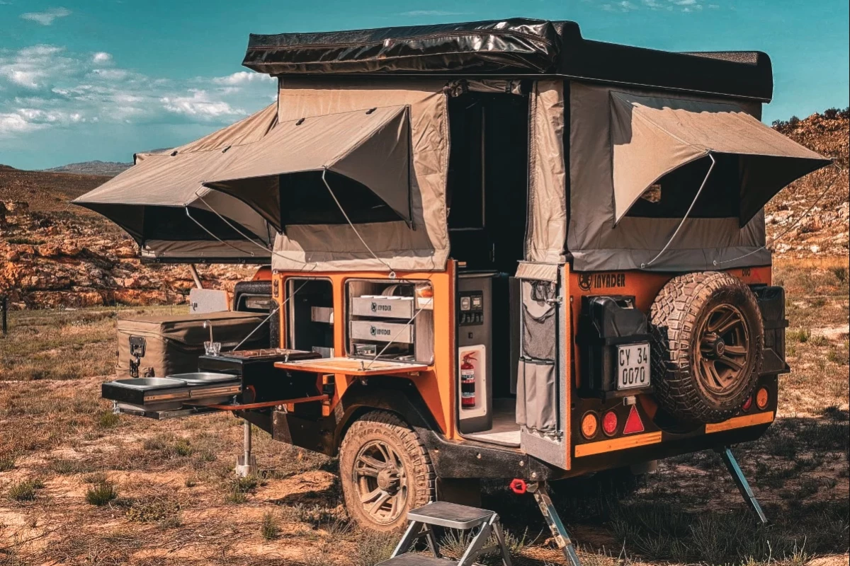 The Duo X's many sliding and folding expansions create an adventurous duplex with dedicated sleeping and cooking spaces and an indoor toilet