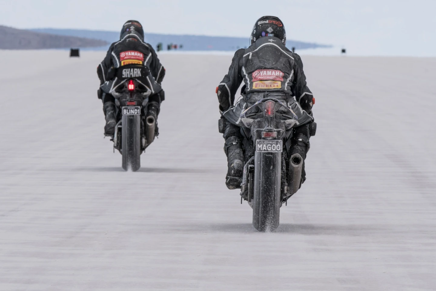 Ex-MotoGP racer Kevin Magee rides behind Felten as he sets the record in 2017