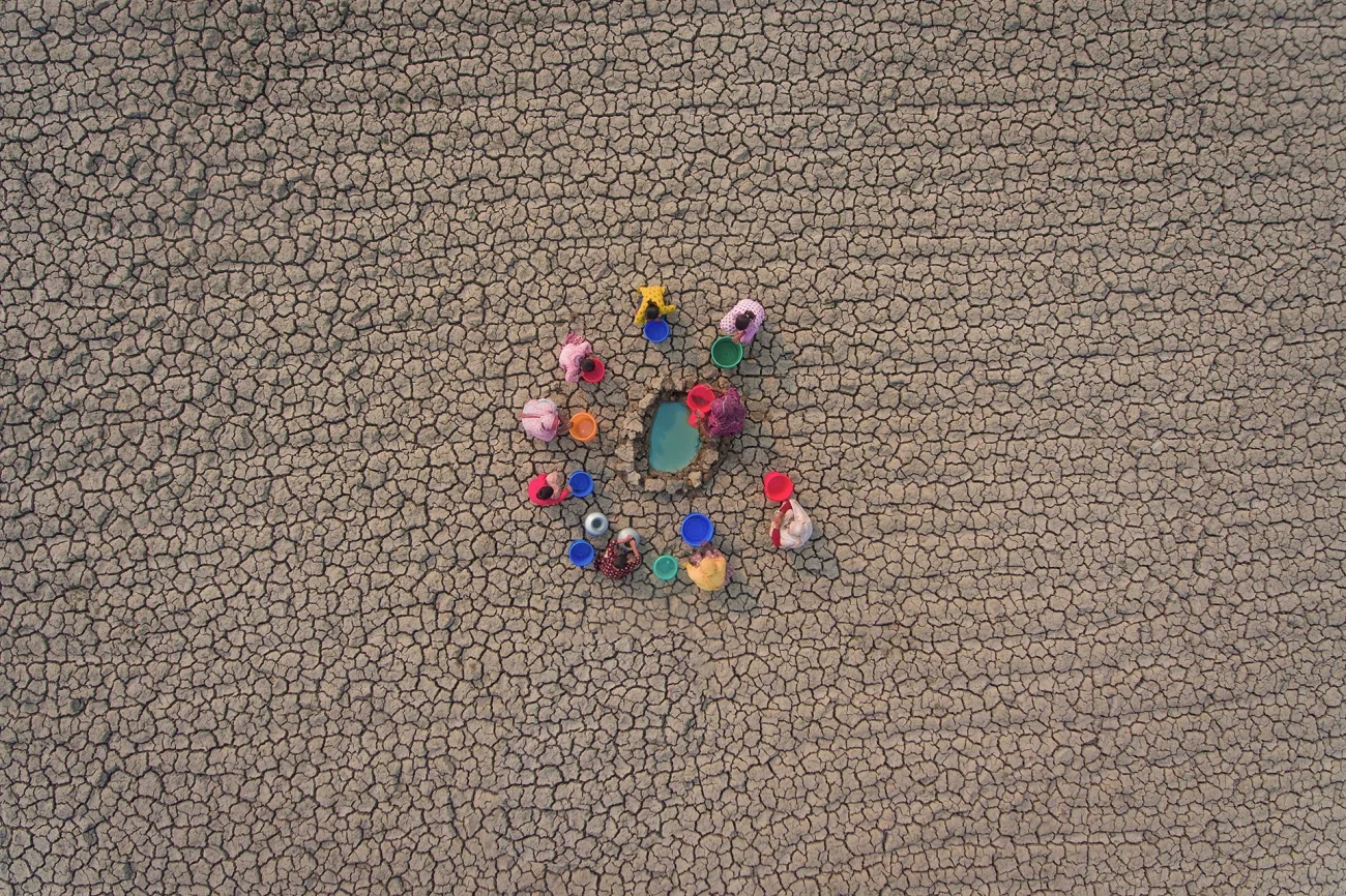 Highly Commended - People. Collecting Water from Driedout Riverbeds. Khulna, Bangladesh