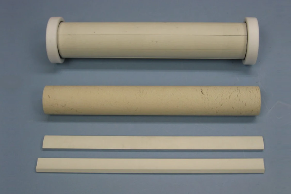 The plasmonic metamaterial cloak (top) and some of components used to make it (Photo: Andrea AlÃ¹)