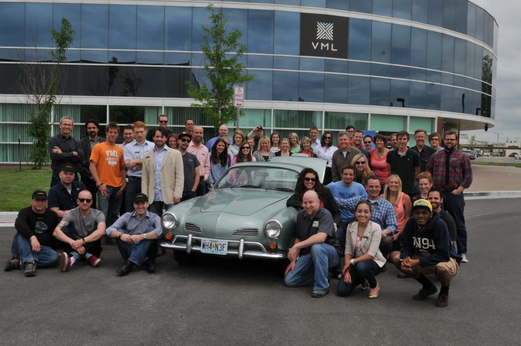 The team (and Ghia) pose for the camera outside the offices of sponsors VML