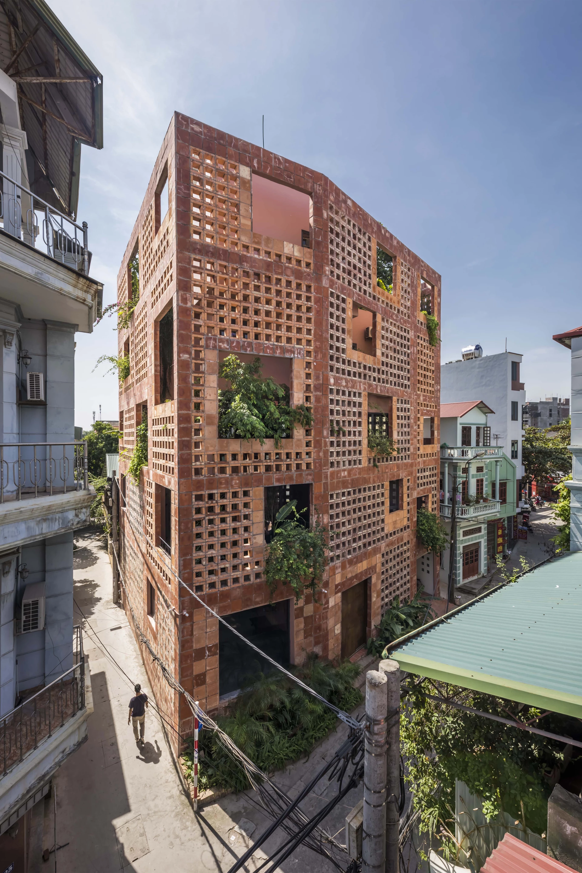 Bat Trang House is part of VTN Architects' ongoing effort to increase the amount of greenery in inner-city Vietnam