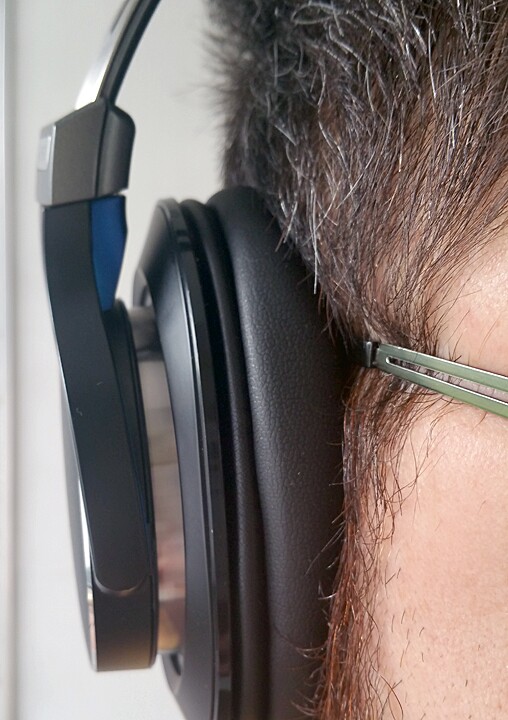 If you wear glasses, the headphones aren't likely to mess with or tweak your vision