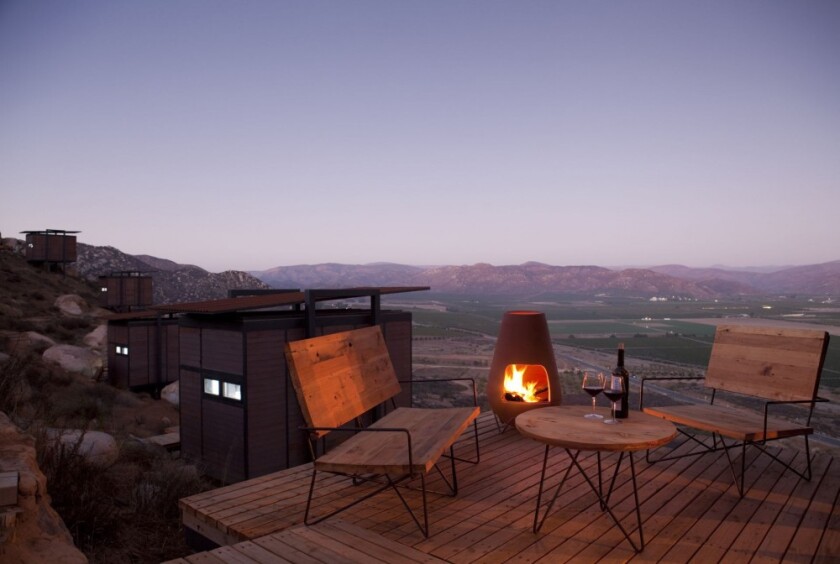 Enjoy a glass of vino from your private terrace and watch the sunset melt behind the mountainous terrain