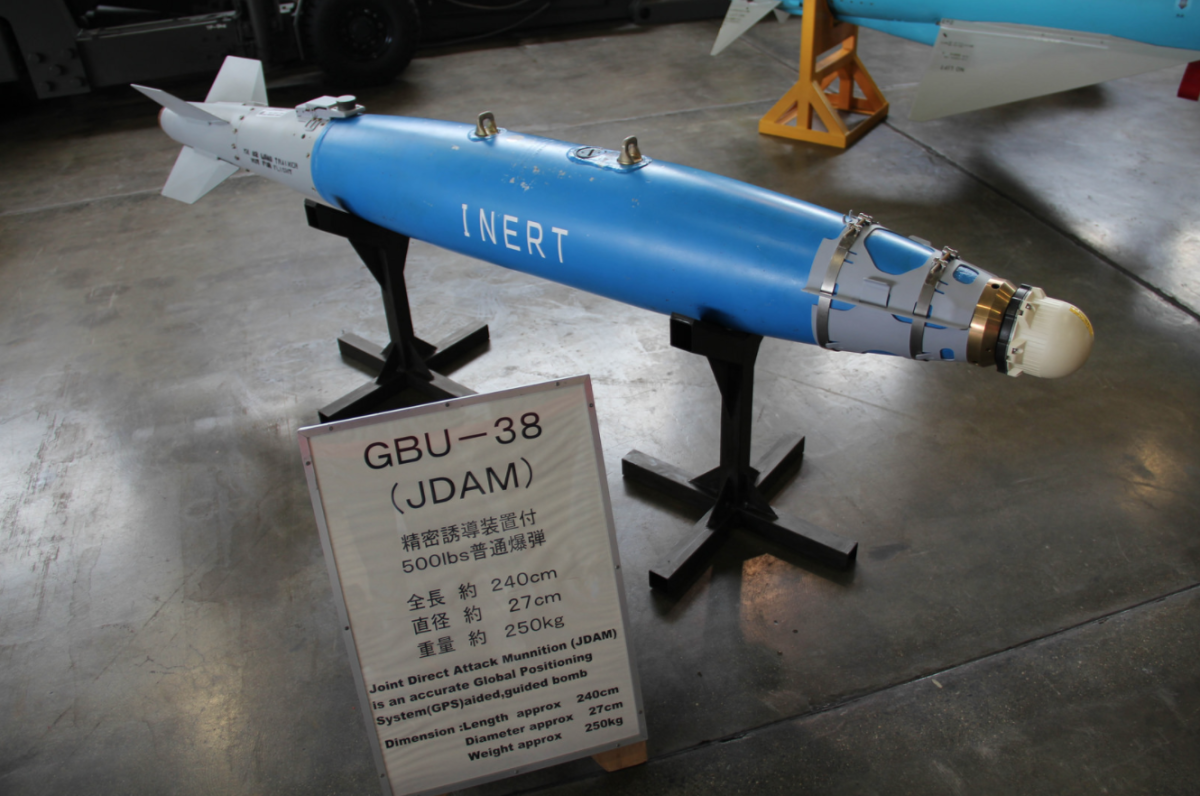 The GBU-38 is a $2000 general-purpose, 500 pound, Mk 82 dumb bomb with an $18,000 guidance system fitted, turning it into a surgically-accurate weapon delivering 192 pounds (89 kg) of Tritonal high explosive from a range of up to 15 miles (24 km)
