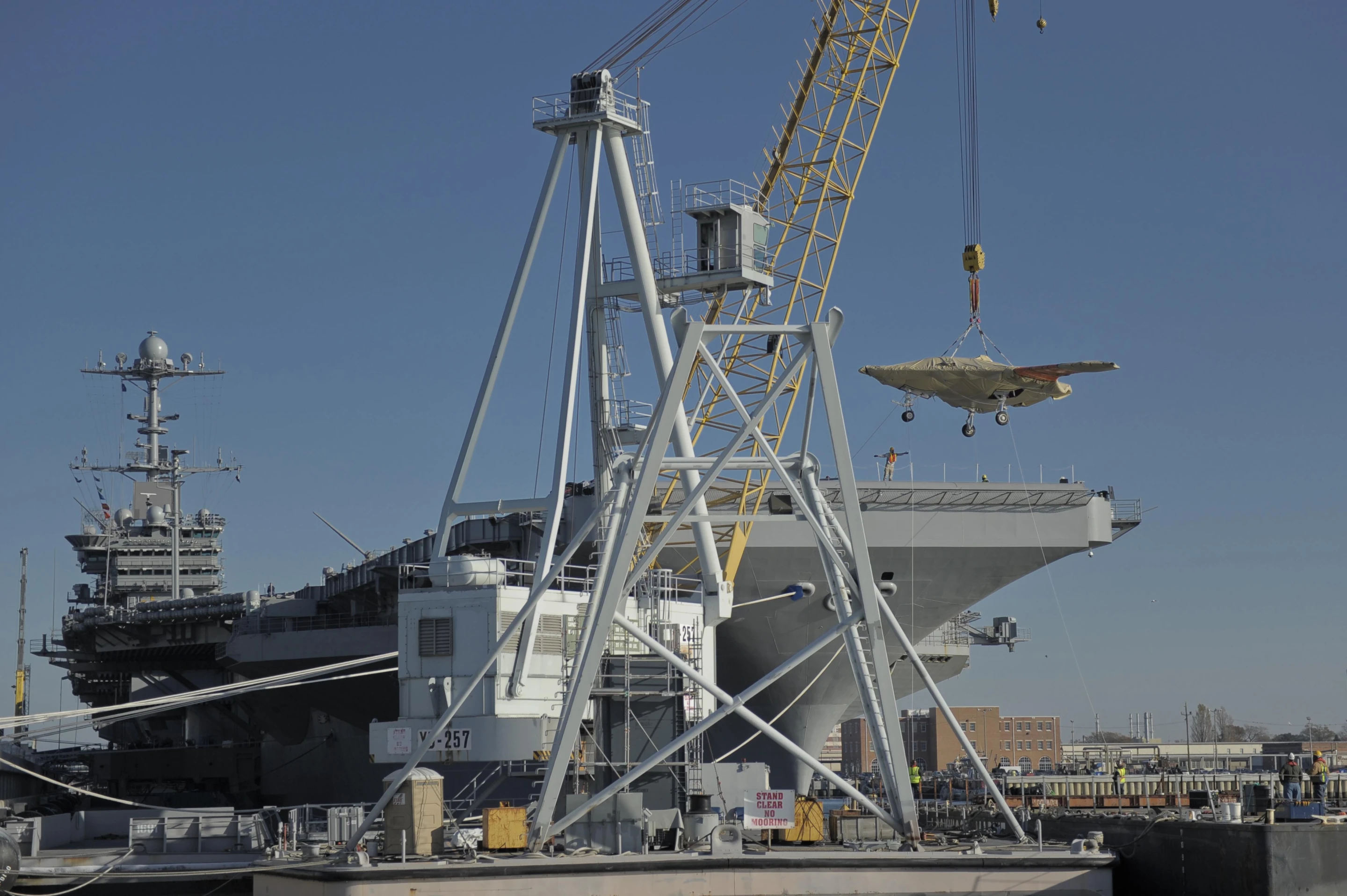 The Northrop Grumman X-47B being shipped aboard the USS Harry S. Truman