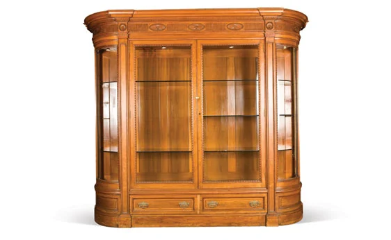 Trophy Cabinet late 19th century. In the style of Robert Adam, the overhanging cornice of breakfront outline carved with flutes alternating with paterae, above two glazed doors with bead and reel carved borders. Around US$6,000 - $ 8,000. Why is this on my list ? I need somewhere to put some old trophies ...