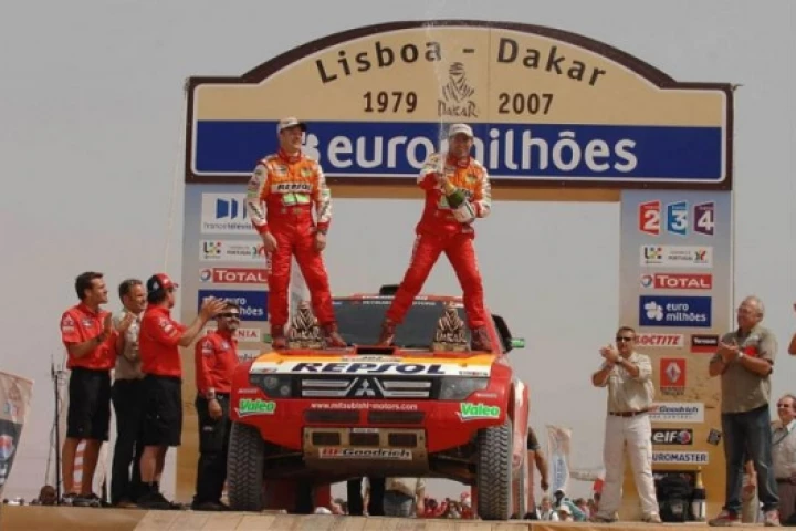 Stephane Peterhansel and Jean-Paul Cottret celebrate their victory in the 2007 Dakar Rally.