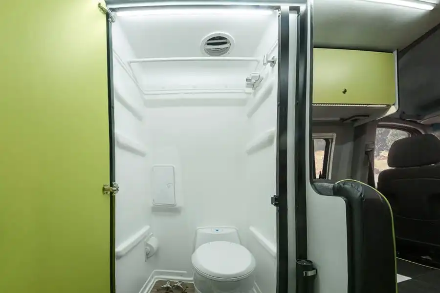 The Winnebago Revel's wet bath includes a toilet that swivels out of the way when not in use