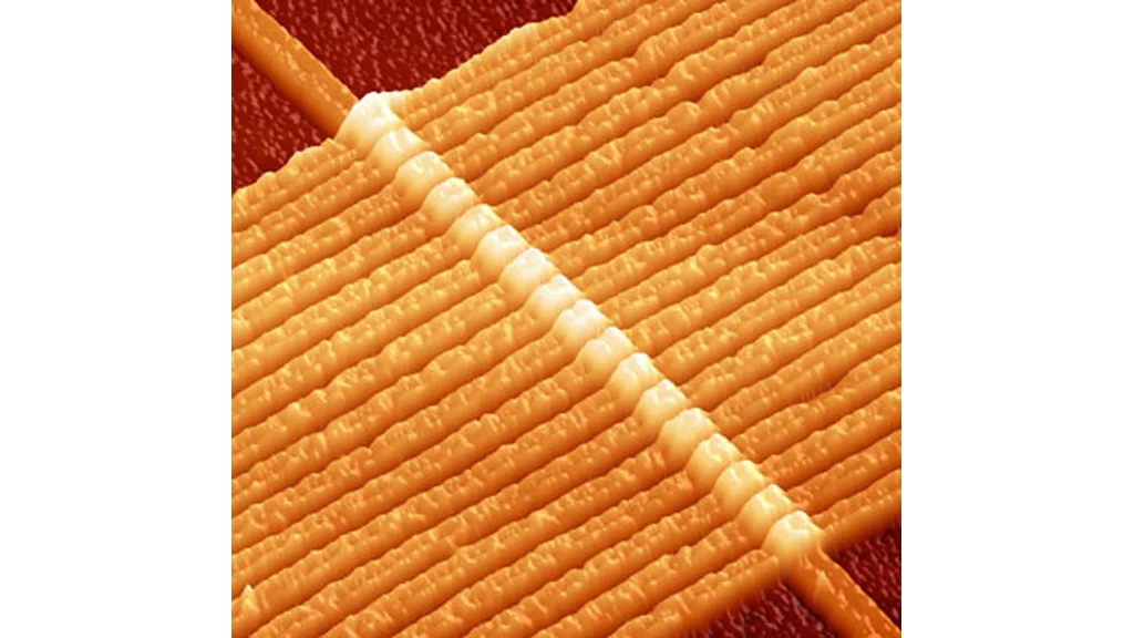 An image of a circuit with 17 memristors, each composed of two layers of titanium dioxide connected by wire, captured by an atomic force microscope. (Image: HP Labs)